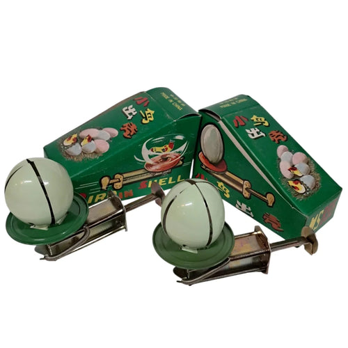 Mid Century Tin Litho Bird In Shell Spinning Toy